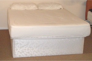 Tall divan style waterbed with a mud mattress